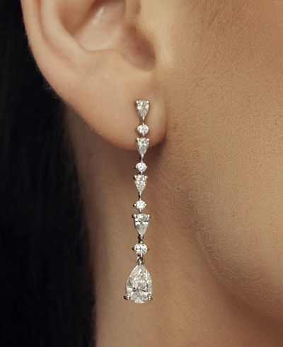 Shop Pnina Tornai earrings.