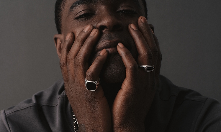 Man wearing 1933 by Esquire jewelry