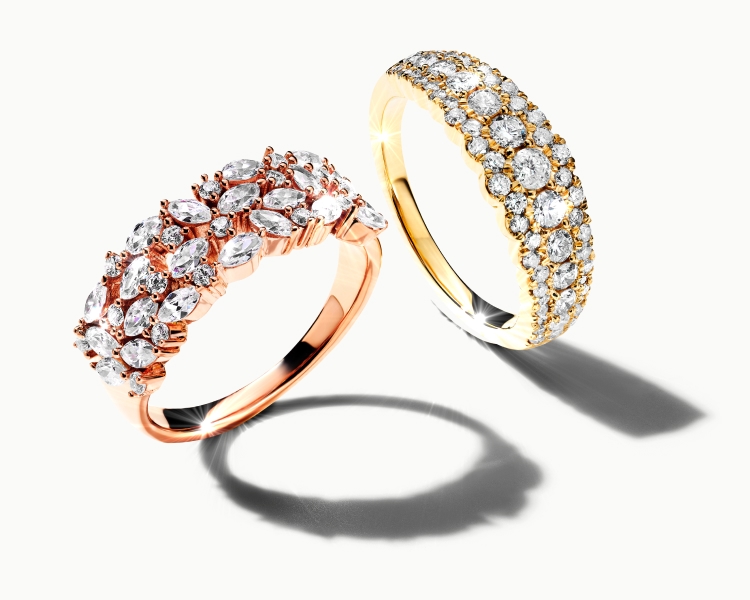 Image of two rings featuring rose gold and yellow gold