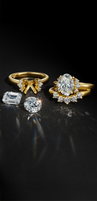 Engagement ring setting and loose diamonds from the Storied Diamond collection.