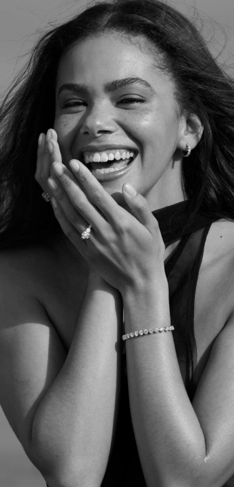 Natural diamond hoop earrings and engagement ring from the Storied Diamond collection.