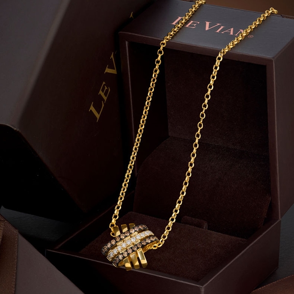 Le Vian boxed item criss cross pendant in 14K yellow gold with brown and white diamonds