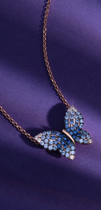 Le Vian Denim Ombre butterfly pendant necklace featuring shades of dark and light blue sapphires.