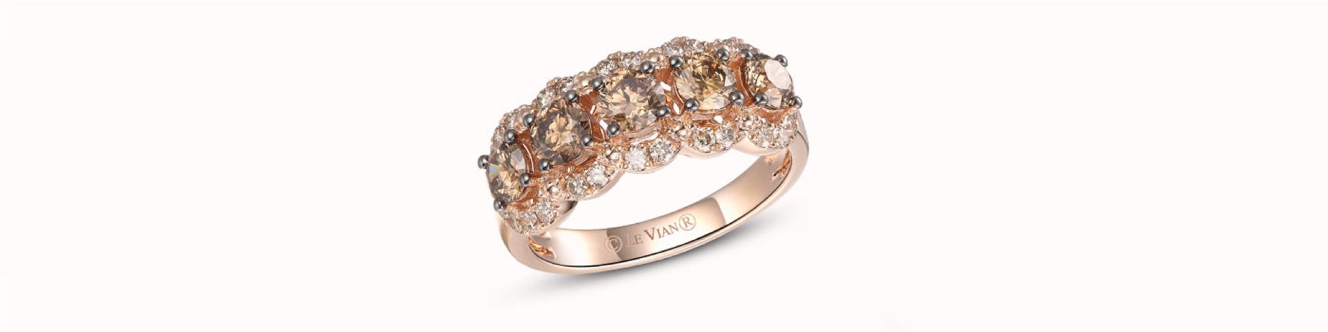 Le Vian 20th Anniversary rose gold jubliee ring, showing round chocolate diamonds on a white background.