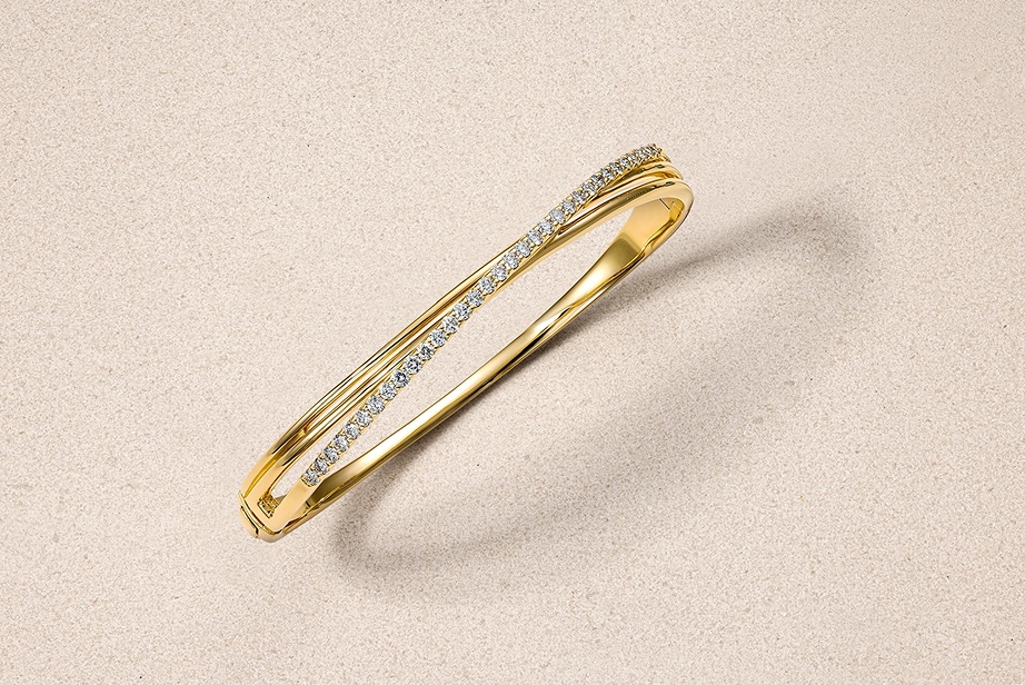 Yellow gold and diamond bangle bracelet