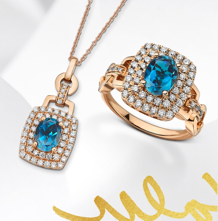Blue topaz ring and necklace with diamond halos set in rose gold. Shop all blue topaz jewelry at Jared.