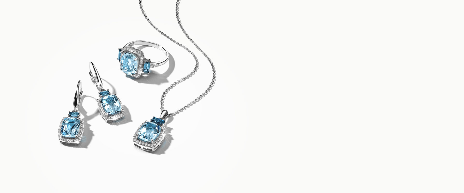 Blue topaz ring, earrings and necklace. Shop all gemstone jewelry at Jared.