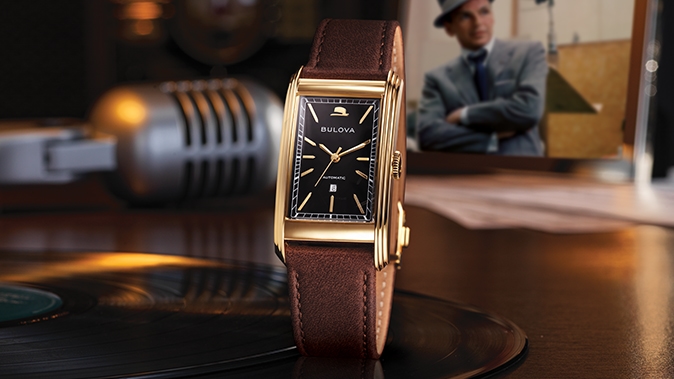 Image of Frank Sinatra watch with a brown leather strap and gold detailing 