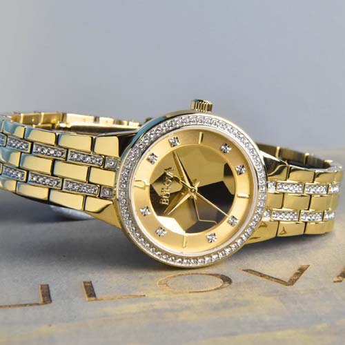 Model wearing a Bulova watches with crystals
