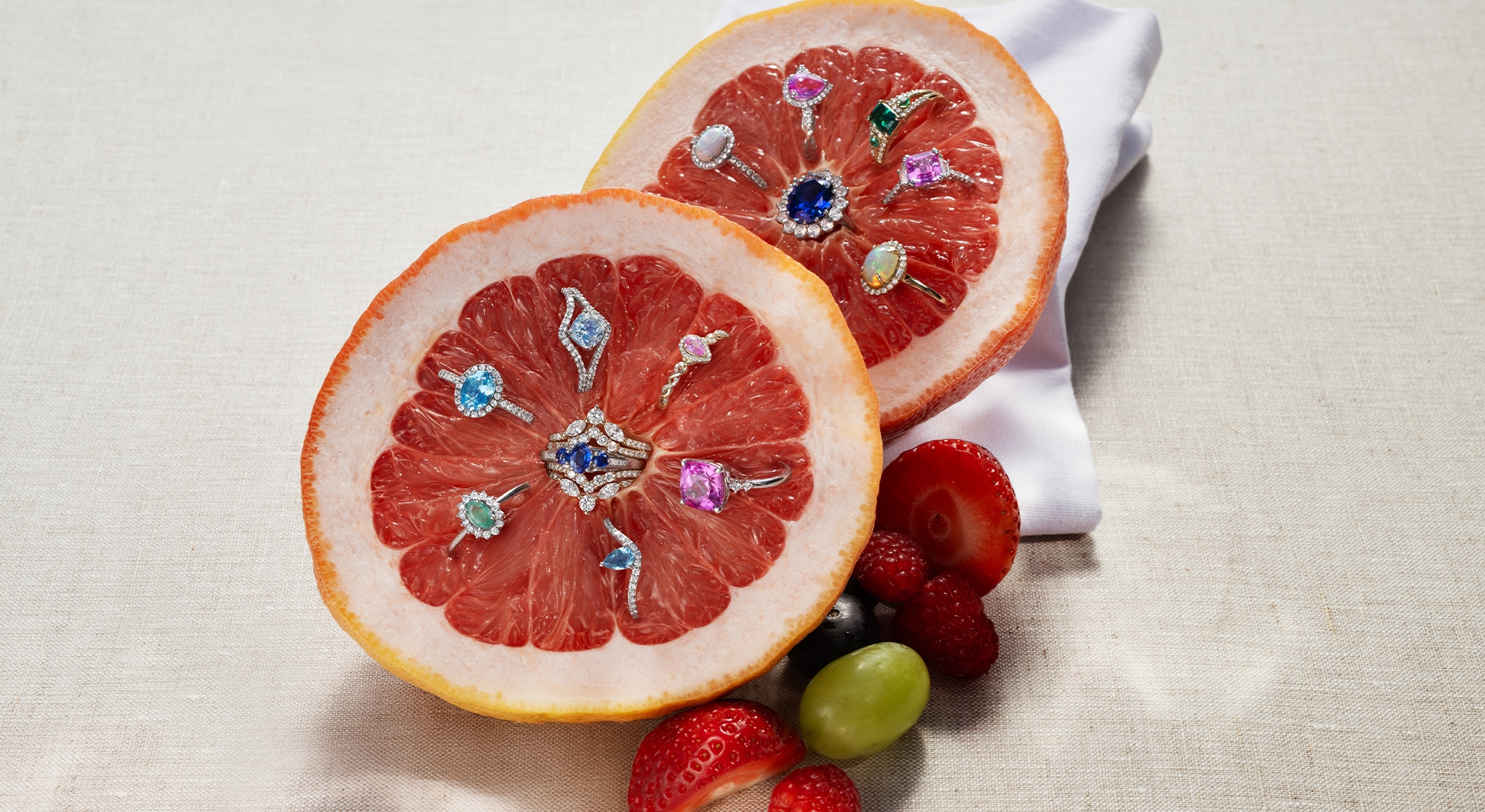 Bold gemstone rings in aquamarine, blue topaz, opal, blue sapphire and pink sapphire