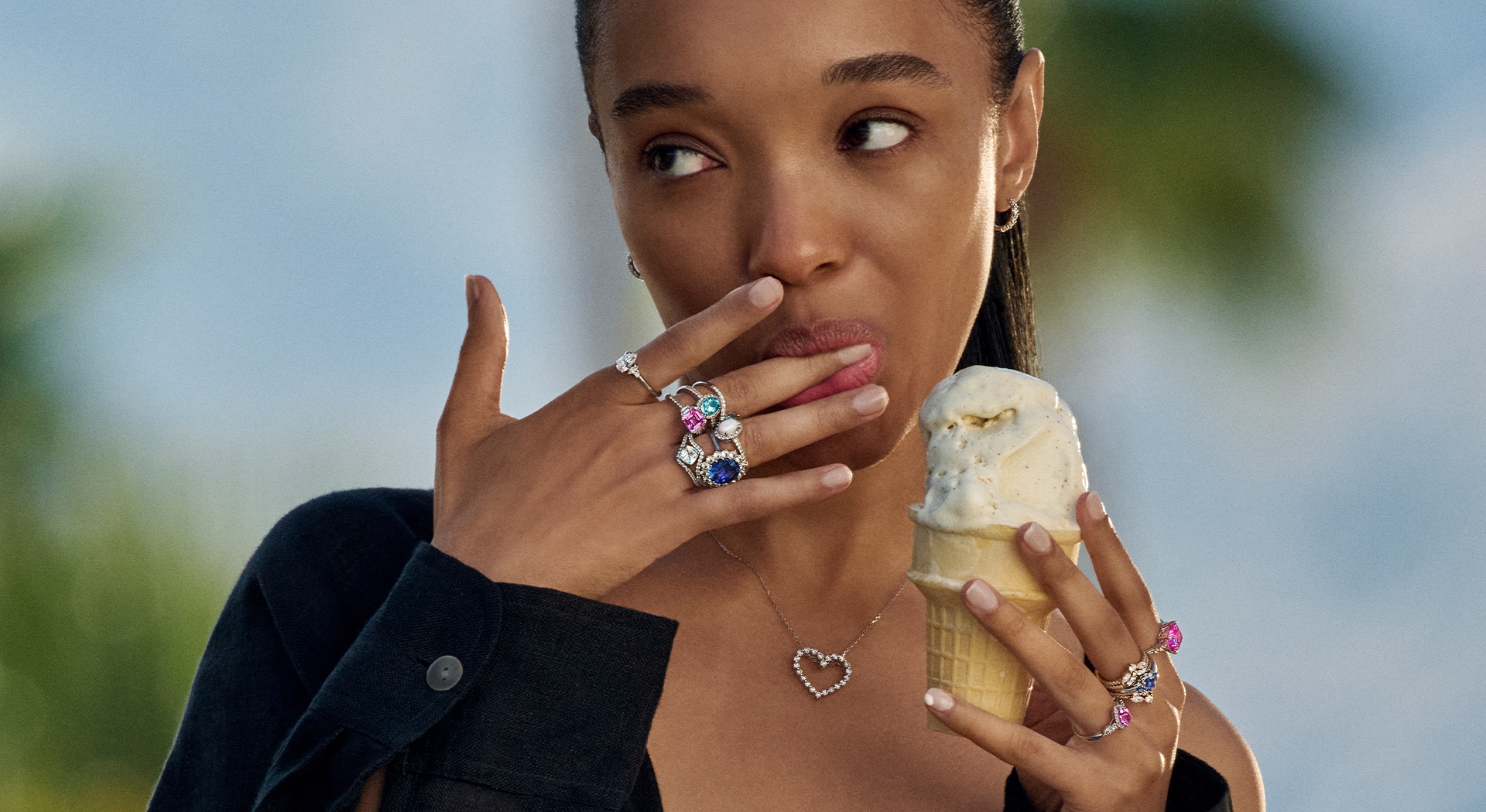 Summer gemstones, featuring gemstone stacking rings in sapphire, opal, blue topaz and aquamarine.