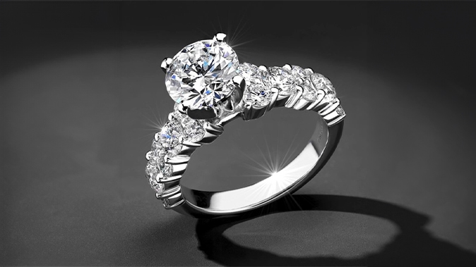 Shop all April diamond birthstone jewelry, image of a diamond engagement ring.