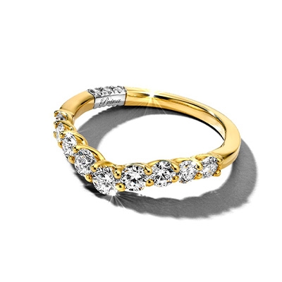 Image of a yellow gold lab-created diamond wedding ring.