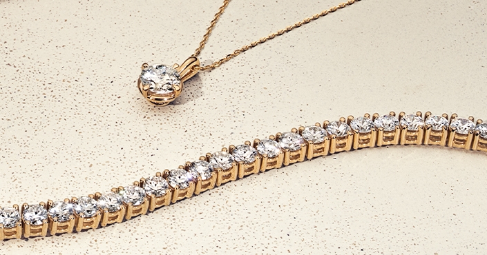 Image of diamonds in black and white. Browse diamond education information at Jared.