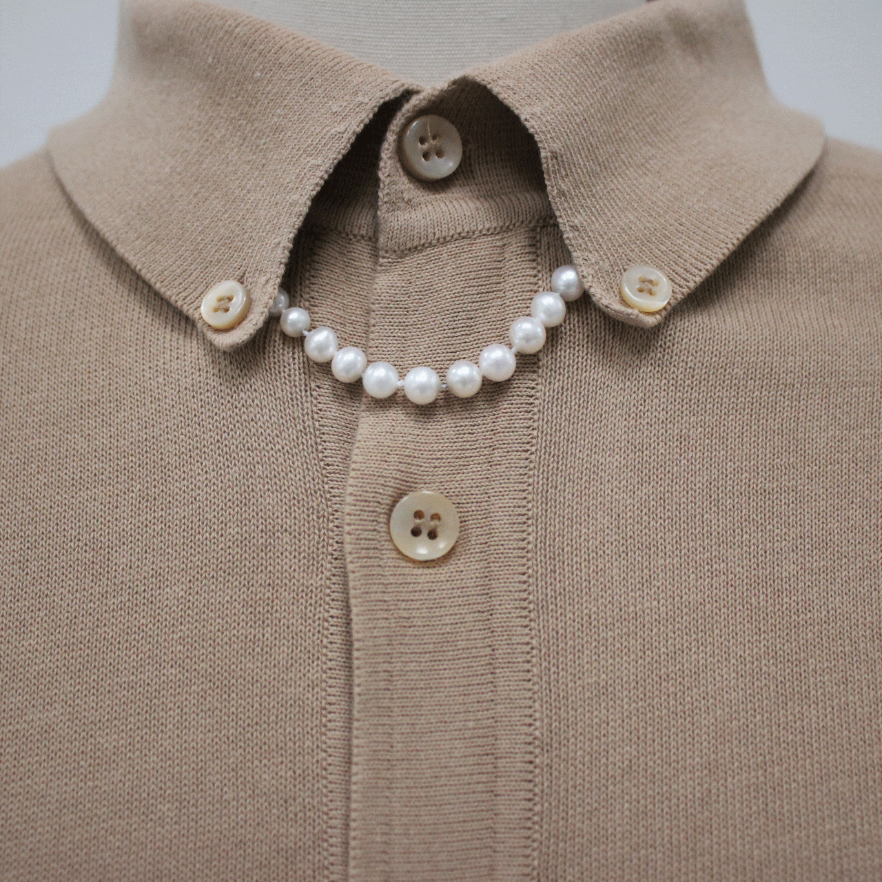 How to style Charm'd by Lulu Frost cultured pearl strand necklace with horseshoe and number 7 charms.