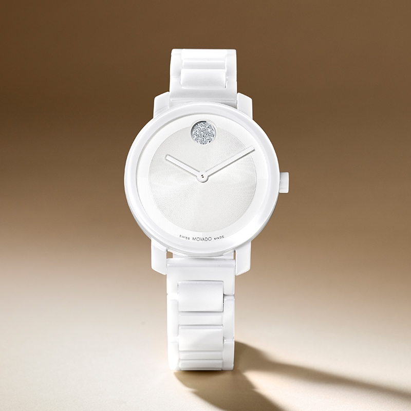 Movado watch with white bracelet and white diamond dial