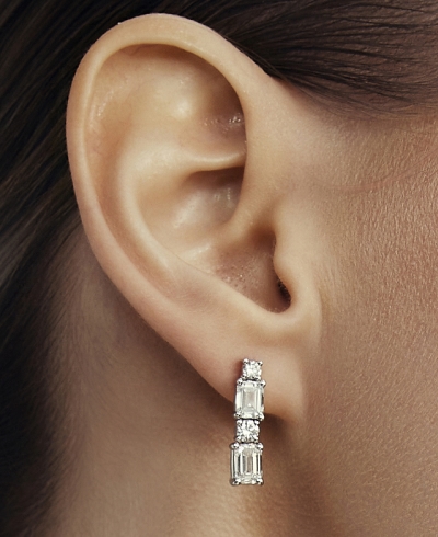 Shop Pnina Tornai earrings.