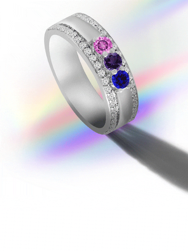 White gold band flashing rainbow colored gemstones