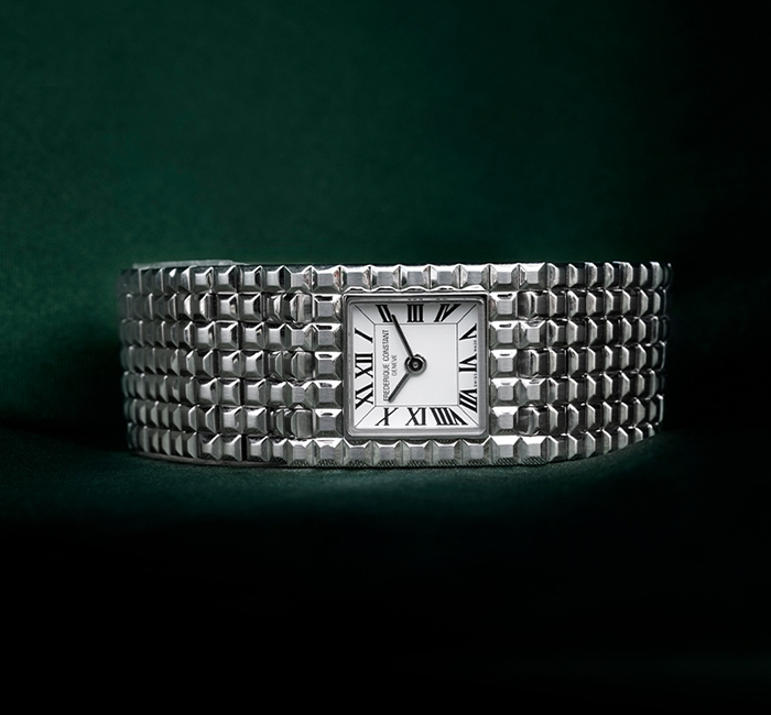 Watch with chain bracelets.