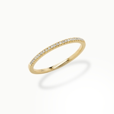 Yellow gold band with diamonds.