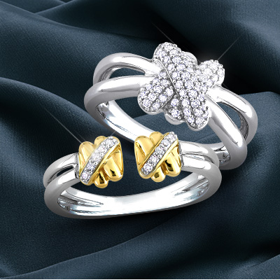White gold ring with white diamonds and two-toned ring with white diamonds from Y Knot Collection