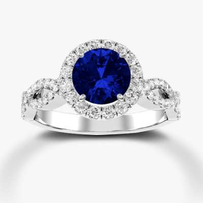  Round blue sapphire with diamond twist mounting in white gold
