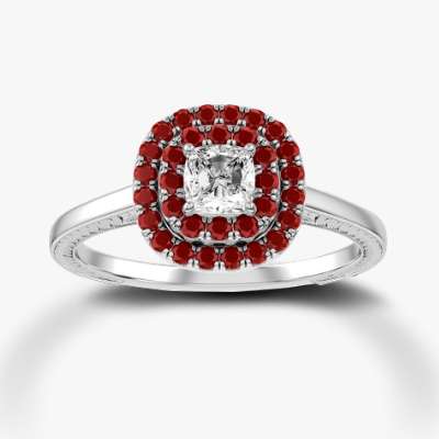 Cushion diamond with ruby double halo in engraved white gold mounting