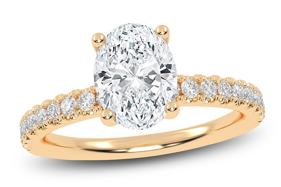 Oval diamond engagement ring with rose gold setting