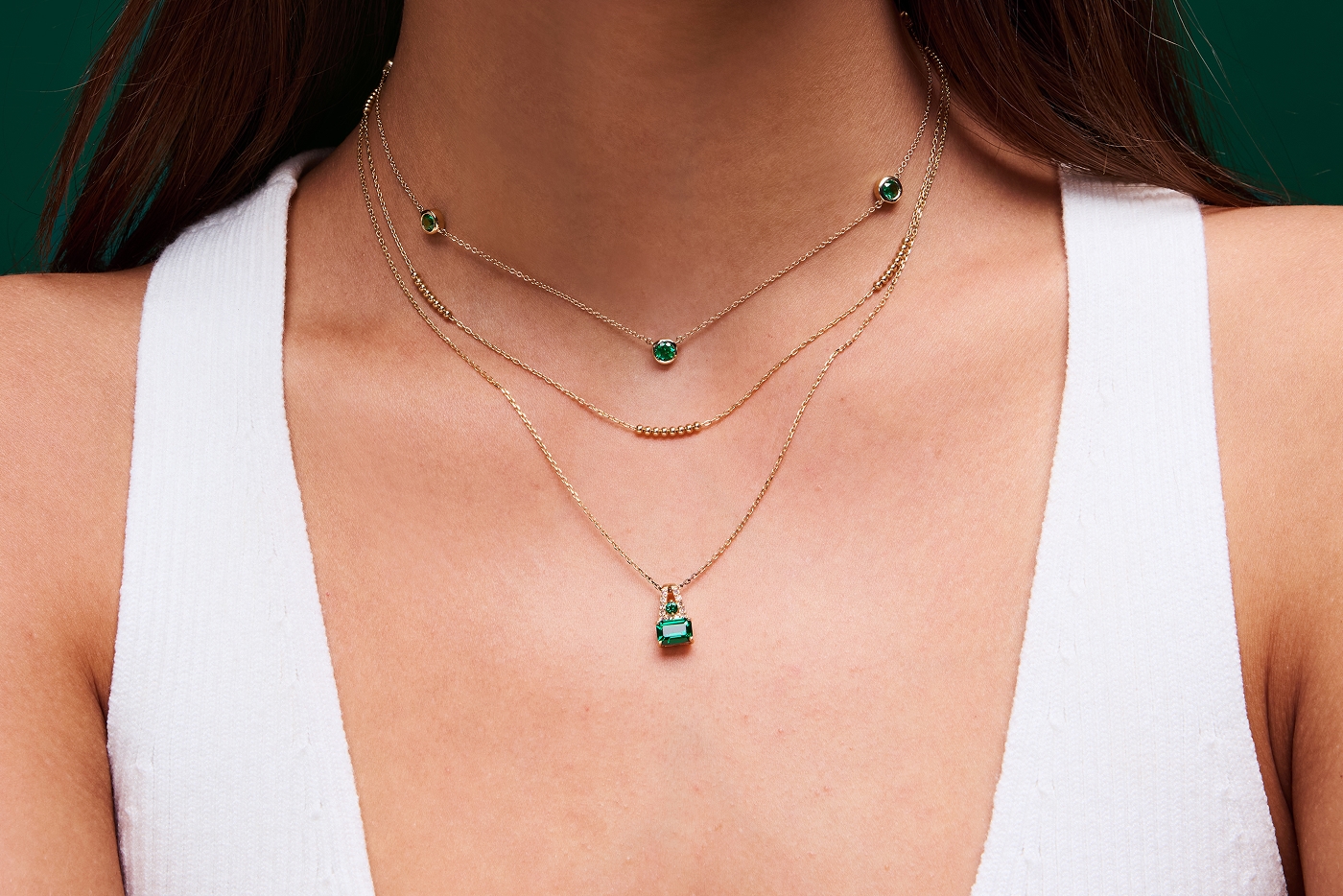 Woman wearing multiple necklaces