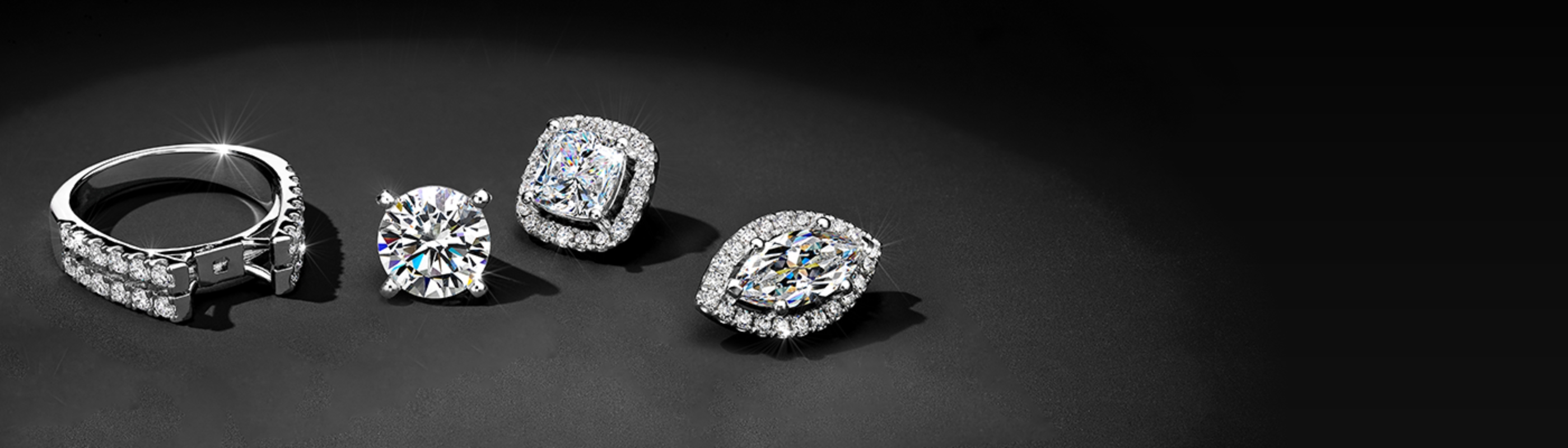 Engagement ring with options for a round solitaire, a cushion halo, or a marquise halo head. 