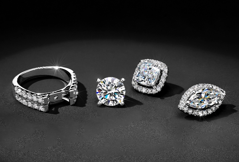 Engagement ring with options for a round solitaire, a cushion halo, or a marquise halo head. 