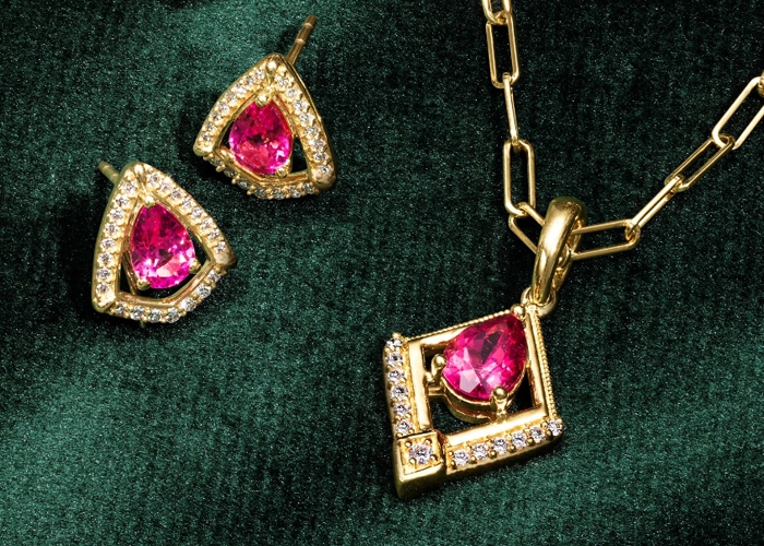 Pink tourmaline necklace and matching earrings from Jared set in yellow gold