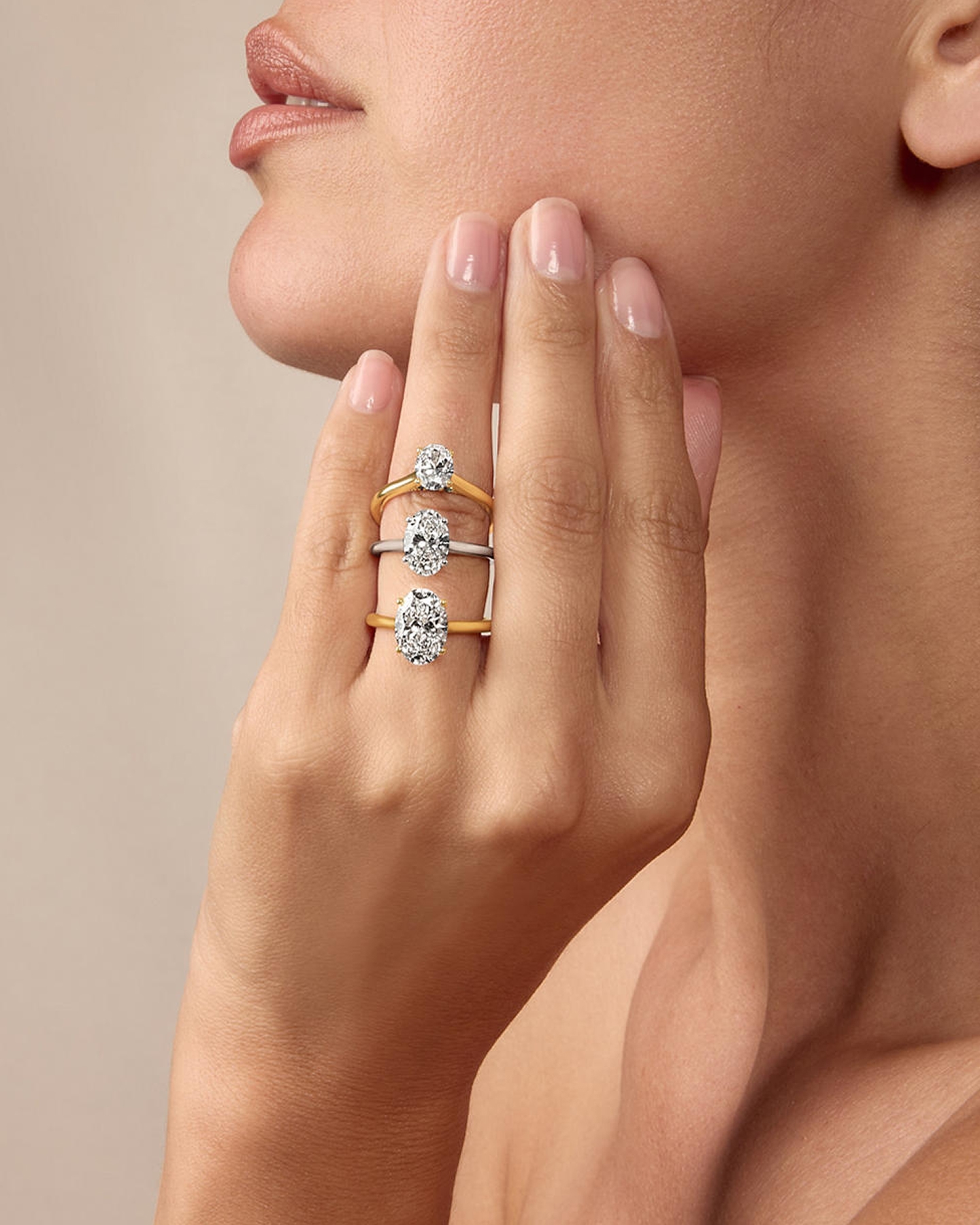 three rings on a models hand