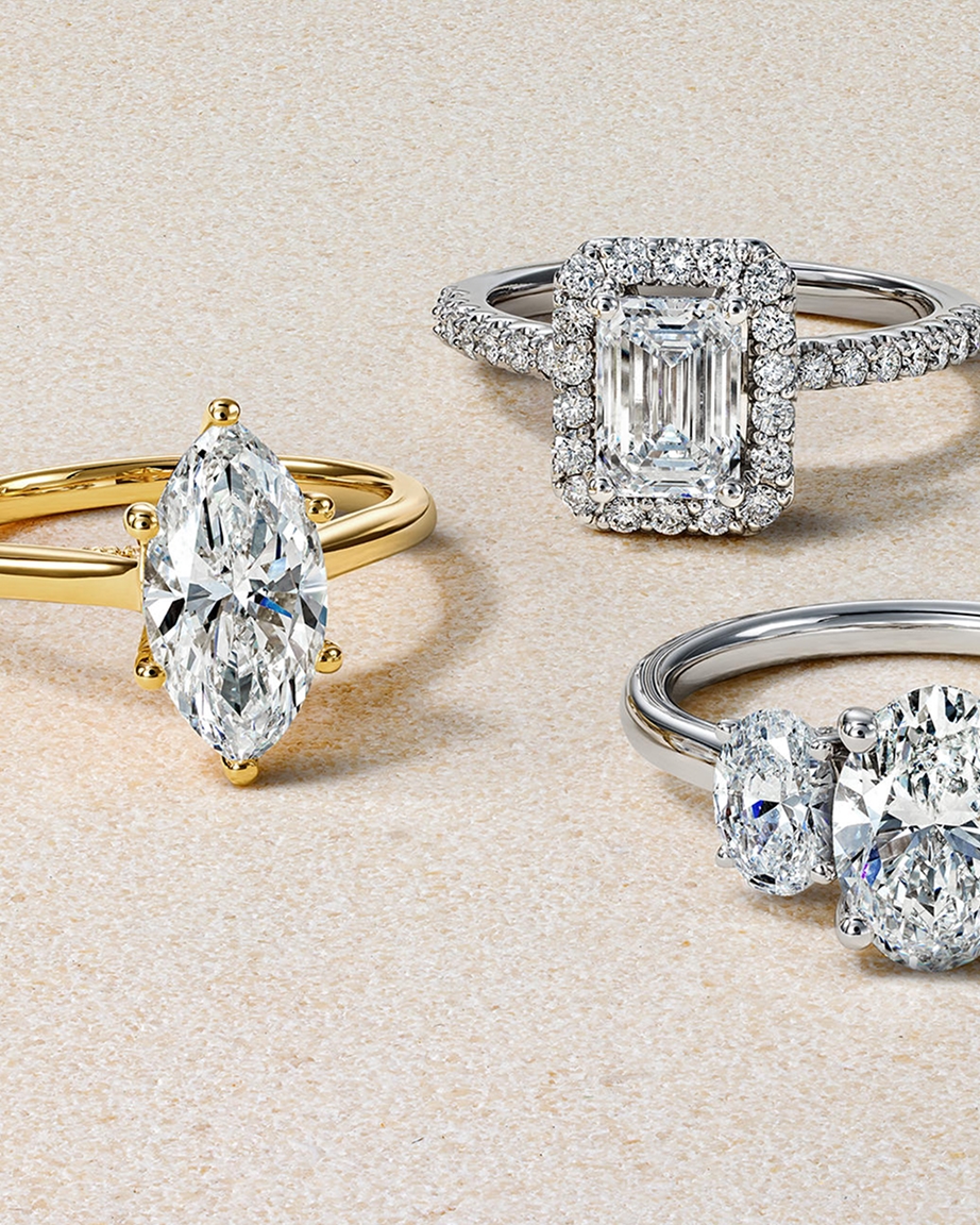 Assorted solitaire diamond rings and metals