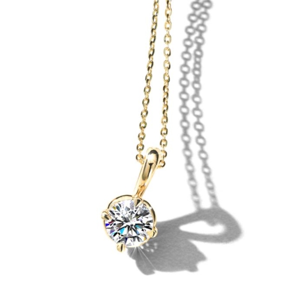 Solitaire necklace set in yellow gold.