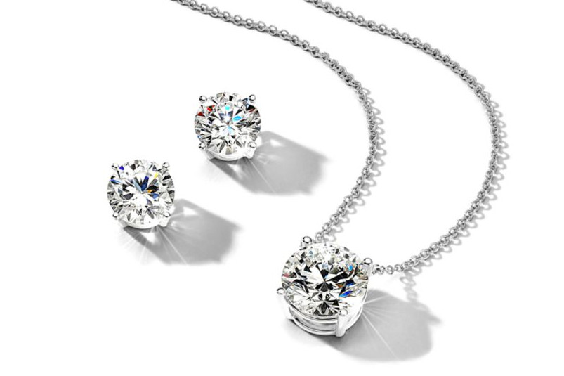 Solitaire diamond stud earrings in round and princess-cut shapes