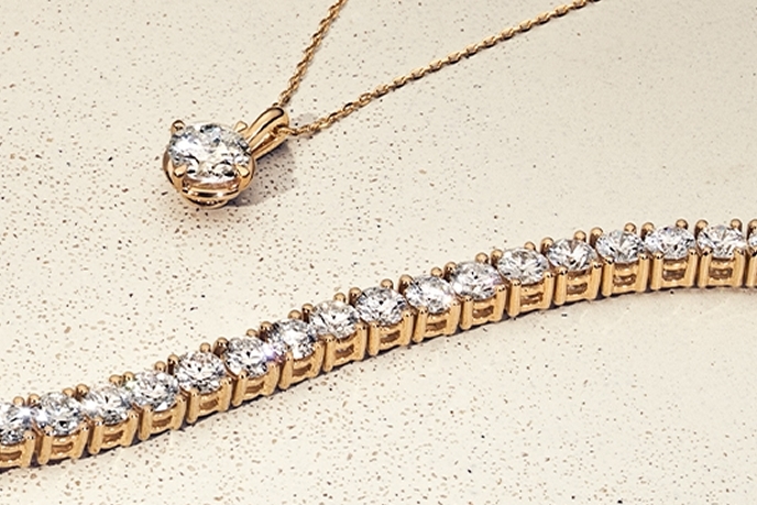 Image of diamonds in black and white. Browse diamond education information at Jared.