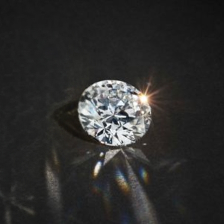 Shop engagement rings with round diamond centers