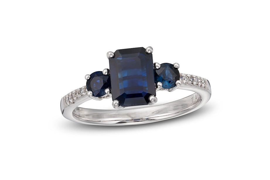 3 Stone engagement ring with 2 sapphire side stones and diamond center stone