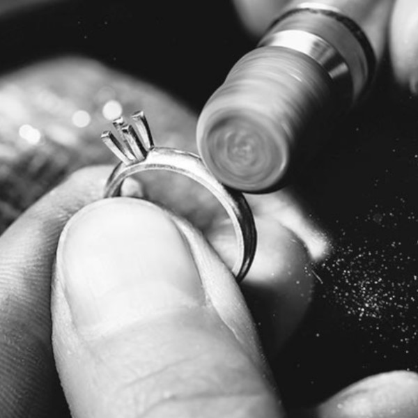 Jewelry polishing solitaire ring setting.