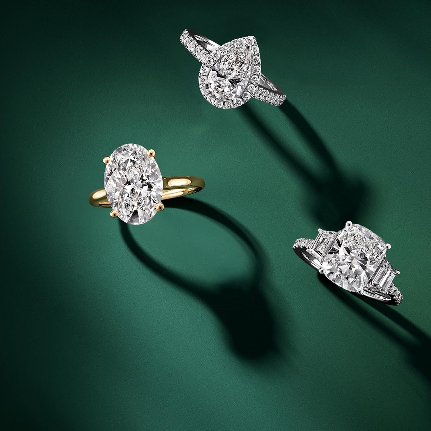 3 diamond engagement rings in white and yellow gold