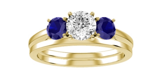 3 stone engagement ring with blue sapphire side stones
