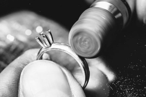 Jeweler polishing ring.