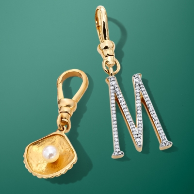 Shop initial charms, gold charms, silver charms, gemstone charms and more.