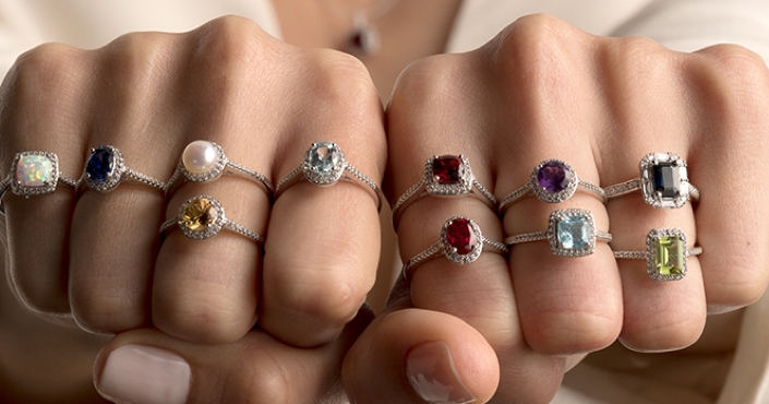 Alternative gemstone rings on hands