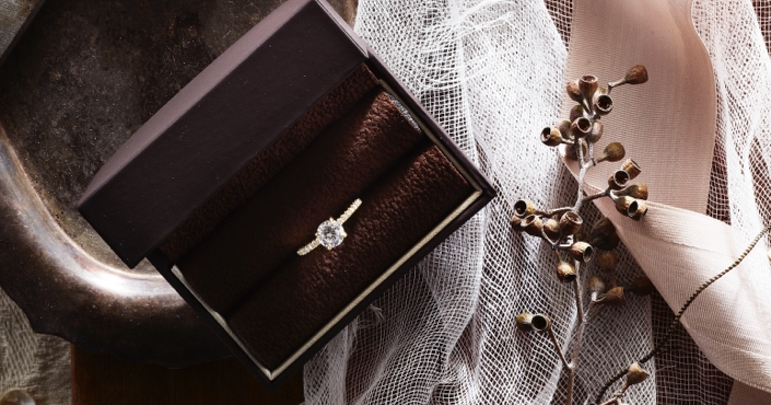 Gifting Diamond Promise Rings. Image of diamond ring in gift box.