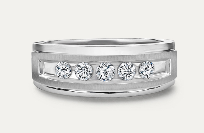Mens white gold band with diamonds along the band