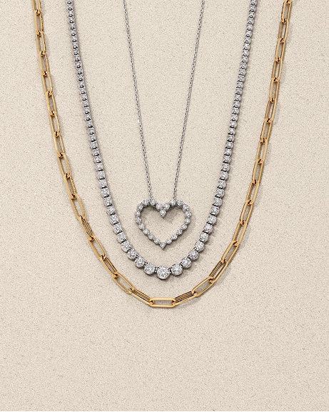 White and yellow gold necklaces and pendants
