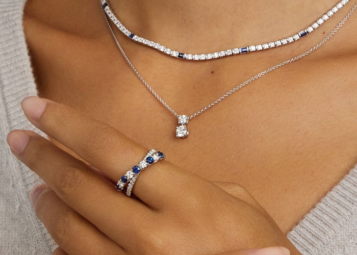 model wearing new white gold and sapphire from Jared