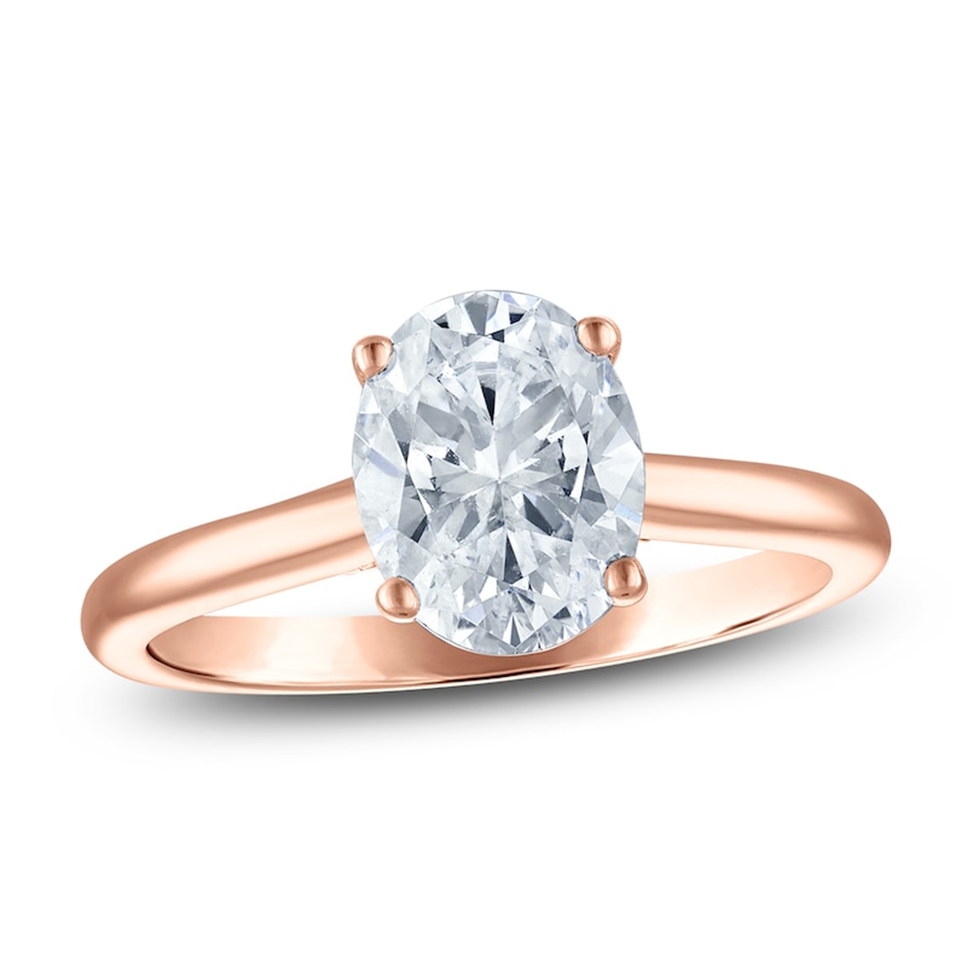 Rose gold solitaire engagement ring with oval center diamond